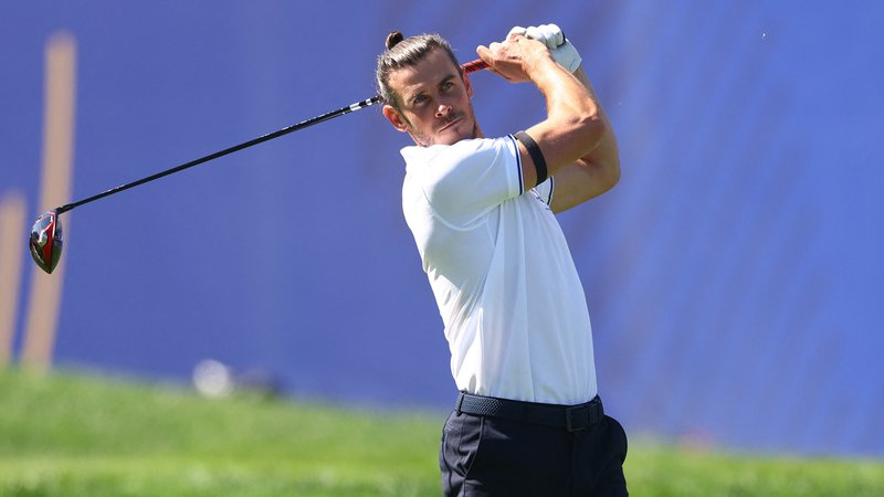 Fotografija: Gareth Bale ob nogometu obožuje tudi igranje golfa. FOTO: Carl Recine/Reuters