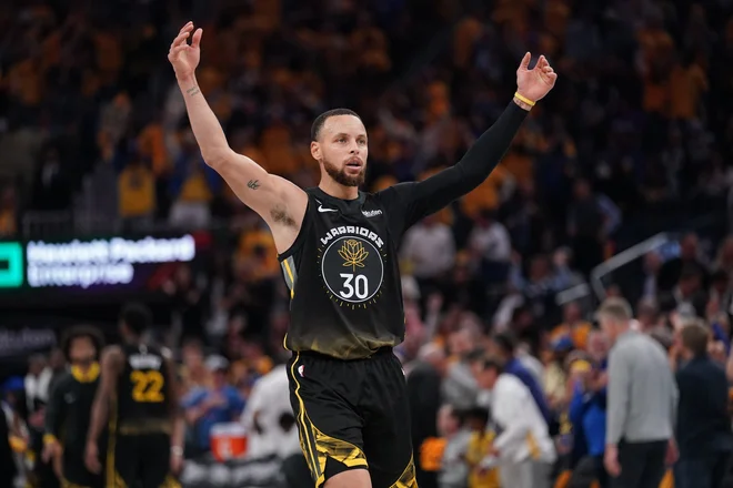 Stephen Curry je izjemen košarkar, a uspehov legendarnega Magica Johnsona še ni dosegel. FOTO: Cary Edmondson/ Usa Today Sports Via Reuters Con