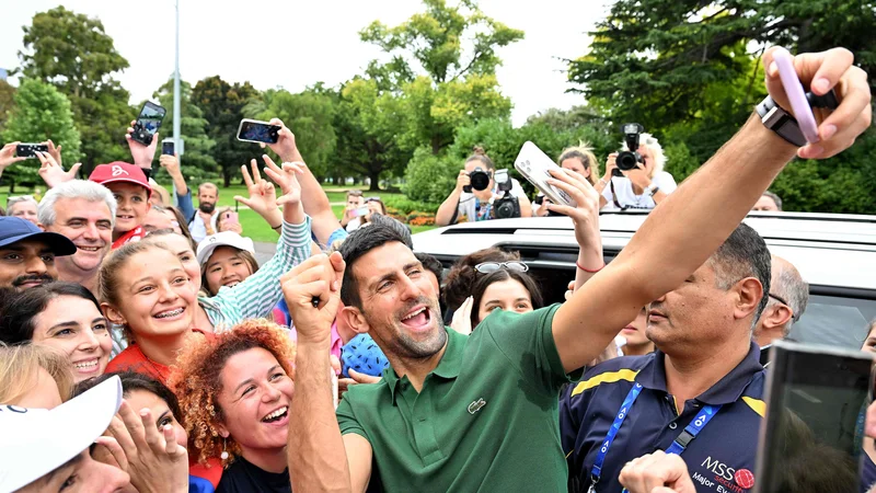 Fotografija: Novak Đoković je januarja desetič osvojil OP Avstralije. FOTO: Saeed Khan/AFP