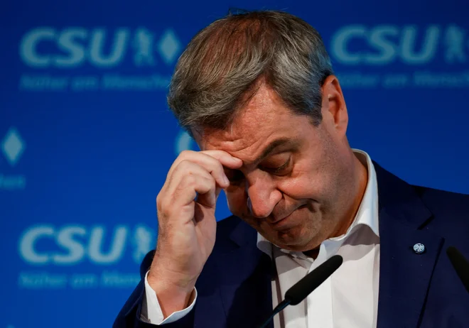Predsednik CSU in bavarski premier Markus Söder ne more biti povsem zadovoljen z rezultati njegove stranke. Svobodni volivci in AfD so mu namreč ukradli precej volivcev. FOTO: Michaela Rehle/REUTERS