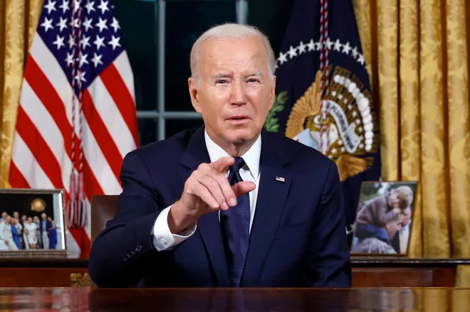 Biden v nagovoru naciji poudaril pomen boja proti Hamasu in Rusiji. FOTO: Jonathan Ernst/AFP
