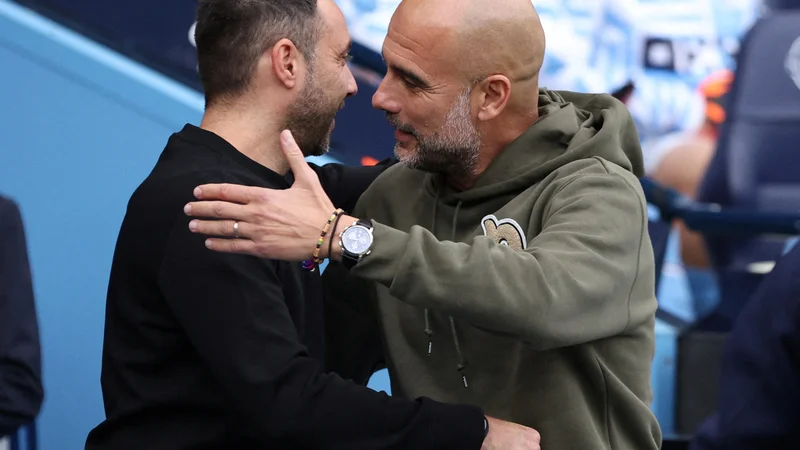 Pep Guardiola zelo ceni in spoštuje Roberta De Zerbija. FOTO: Phil Noble/Reuters