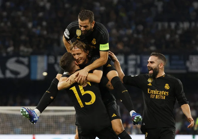 Real Madrid se je veselil izenačenja v Sevilli. FOTO: Ciro De Luca/ Reuters
