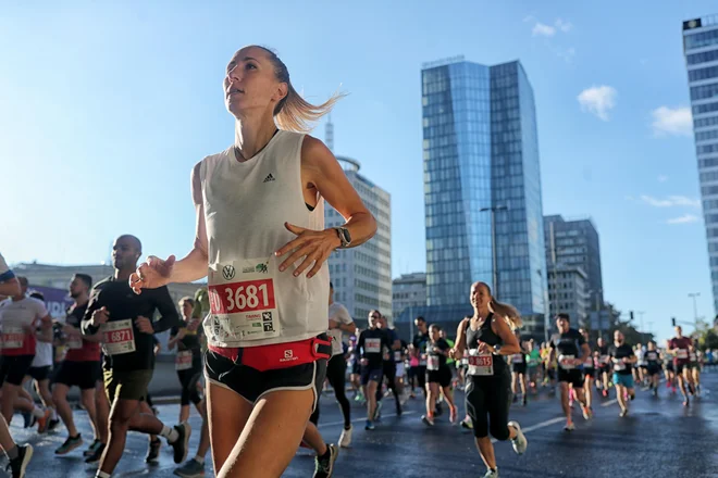 Kenijec Edmond Kipngetich s časom 2:06:47 in Etiopijka Gerado Senbeta Zinash z rekordom proge 2:21:05 sta bila najboljša maratonca na 42 kilometrov na 27. Volkswagen ljubljanskem maratonu. Foto: Blaž Samec/Delo