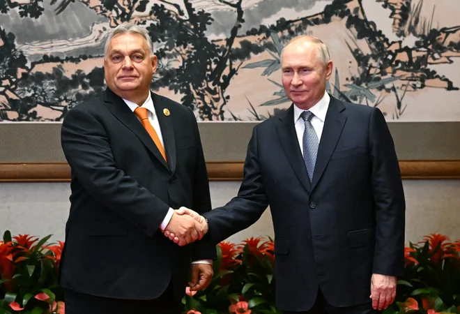 Orbánovo pajdašenje s Putinom mnoge v Bruslju navdaja z nezadovoljstvom. FOTO: Sputnik/Reuters