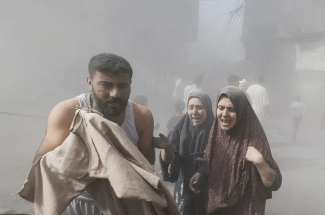 Izrael je ponoči izvedel večjo kopensko ofenzivo na severu Gaze. FOTO: Mohammed Salem/Reuters