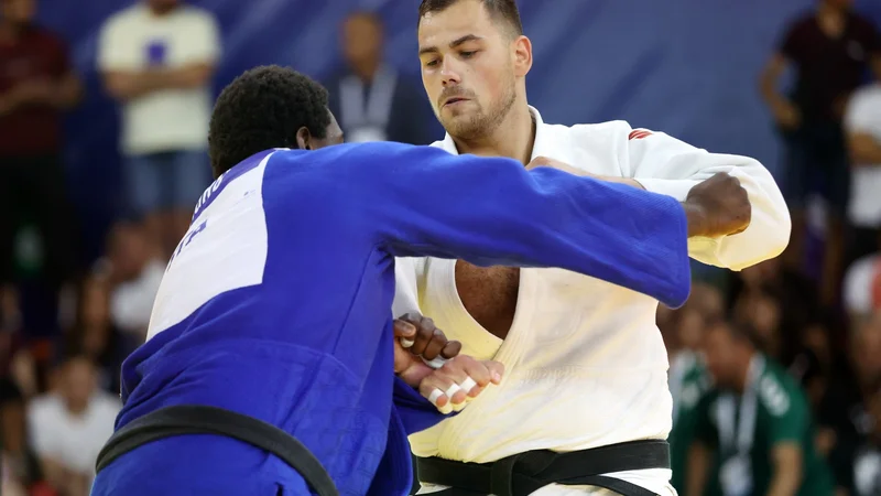 Fotografija: Vito Dragič (desno) si je v Abu Dabiju izbojeval deveto mesto. FOTO: OKS