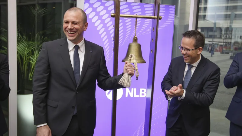 Fotografija: Po oceni predsednika uprave Ljubljanske borze Aleša Ipavca (desno) je kotacija NLB, ki jo vodi Blaž Brodnjak, prinesla na kapitalski trg enega od vodilnih akterjev, ki zdaj postavlja visoke standarde ostalim borznim družbam. Foto Jože Suhadolnik