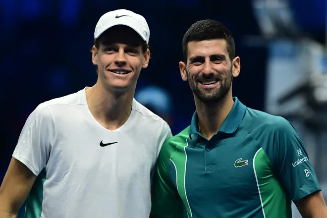 Jannik Sinner je Novaku Đokoviću omogočil uvrstitev v polfinale. FOTO: Tiziana Fabi/AFP