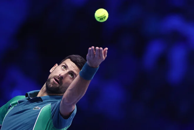 Novak Đoković je sezono končal, kot jo je začel, z zmago. FOTO: Guglielmo Mangiapane/Reuters