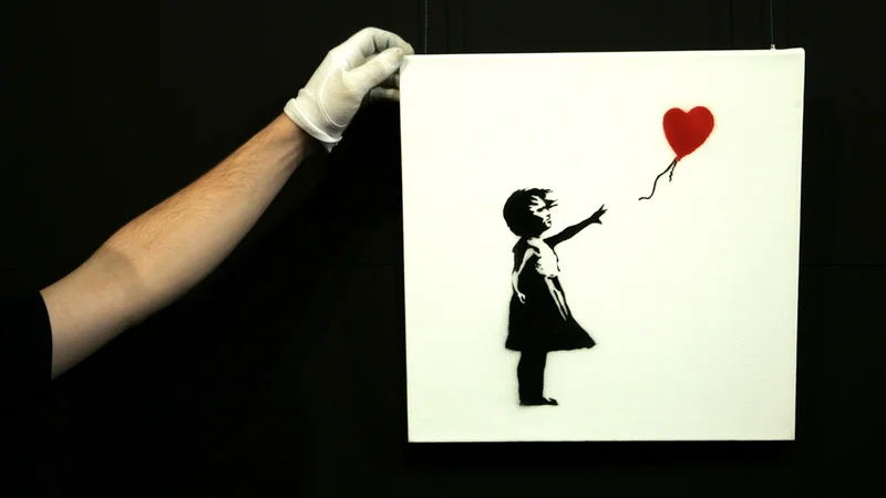 Fotografija: Deklica z balonom je ena njegovih najbolj prepoznavnik slik. FOTO: Reuters