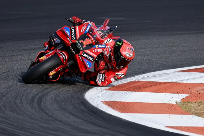 Francesco Bagnaia je z zmago potrdil naslov svetovnega prvaka. FOTO: Jose Jordan/AFP