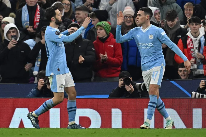 Phil Foden je bil med tednom najboljši igralec na zelenici ob zmagi Cityja nad Leipzigom. FOTO: Paul Ellis/AFP