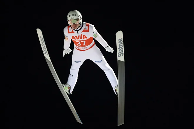 Anže Lanišek se je prvič v sezoni prebil med elitno deseterico. FOTO: Geir Olsen/Reuters