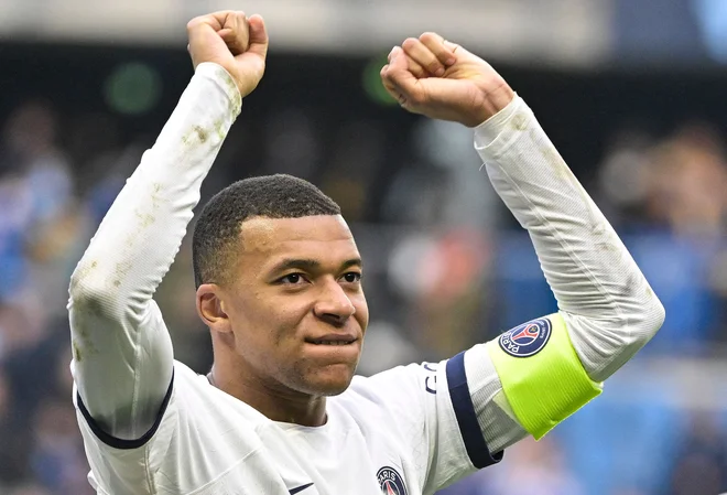 Kylian Mbappe blesti pri PSG in francoski reprezentanci. FOTO: Damien Meyer/AFP