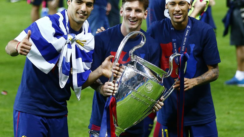 Fotografija: Nepozabni trojček,ki je pisal nogometno zgodovine Barcelone in lige prvakov, Luis Suarez, Lionel Messi in Neymar. FOTO: Kai Pfaffenbach/Reuters