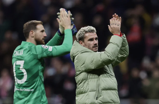 Antoine Griezmann in Jan Oblak sta ključni figuri in nosilca upov madridskega Atletica. FOTO: Juan Medina/Reuters