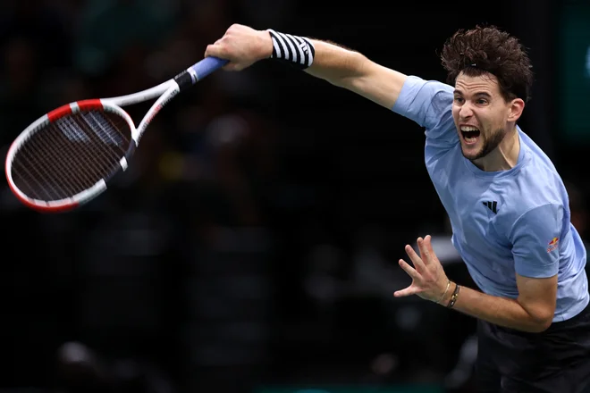Dominic Thiem tega dne zlepa ne bo pozabil. FOTO: Stephanie Lecocq/Reuters