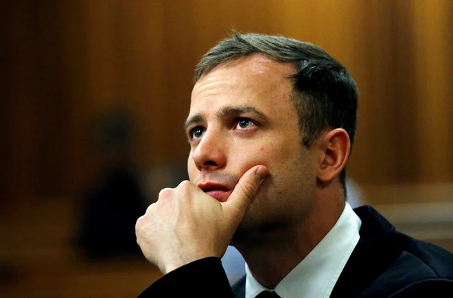 Oscar Pistorius je na prostosti, a za svoje dejanje nikoli ne bo oproščen. FOTO: Siphiwe Sibeko/Reuters