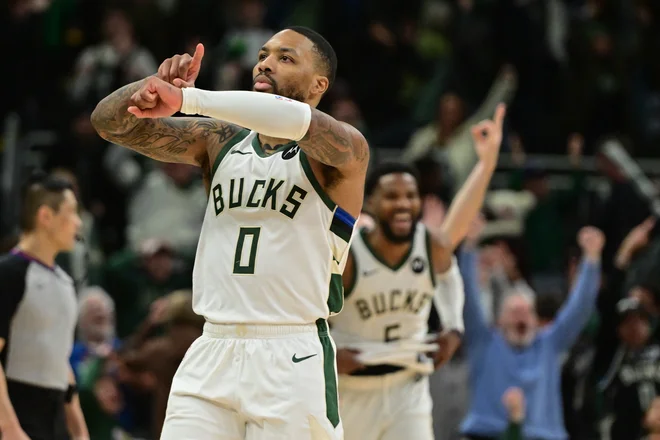 Damian Lillard je zagotovil navijačem šov in pravo veselico po tekmi. FOTO: Benny Sieu/Usa Today Sports