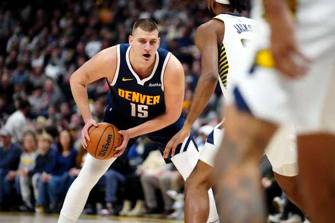 Nikola Jokić med akcijo. FOTO: Ron Chenoy/Usa Today Sports