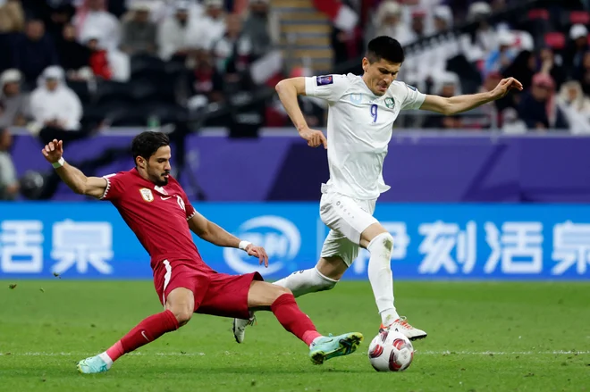 Uzbekistan je deloval dobro kljub številnim odsotnim nosilcem igre in je bil blizu presenečenja v četrtfinalu AP. FOTO: Karim Jaafar/AFP