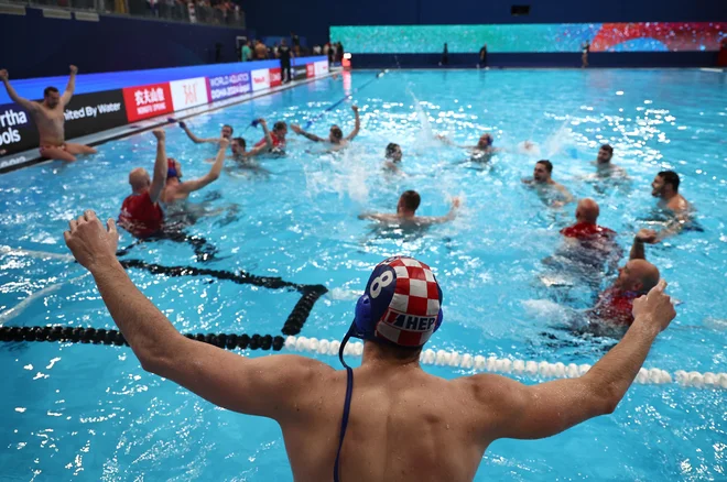 Zlato veselje barakud, kakor priljubljeno imenujejo hrvaške vaterpoliste. FOTO: Marko Djurica/Reuters