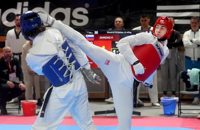 Patrik Divković (na fotografiji desno) je zaradi lažje poškodbe predal polfinalni dvoboj. FOTO: Blaž Samec/Delo