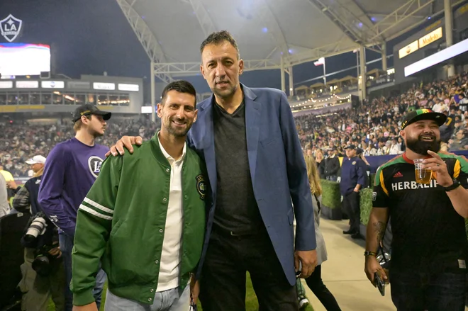 Novak Đoković je v družbi rojaka in slavnega košarkarja Vlade Divca minuli konec tedna spremljal nogometni dvoboj Los Angeles Galaxyja in Interja iz Miami z Lionelo Messijem v glavni vlogi. tedna. FOTO: Jayne Kamin-oncea/Usa Today Sports Via Reuters Con