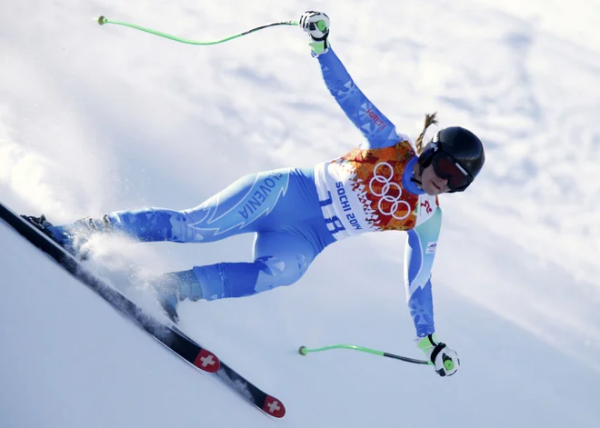Pred 10 leti je Tina Maze v Sočiju drvela k olimpijskima naslovoma v smuku in veleslalomu. FOTO: Mike Segar/Reuters