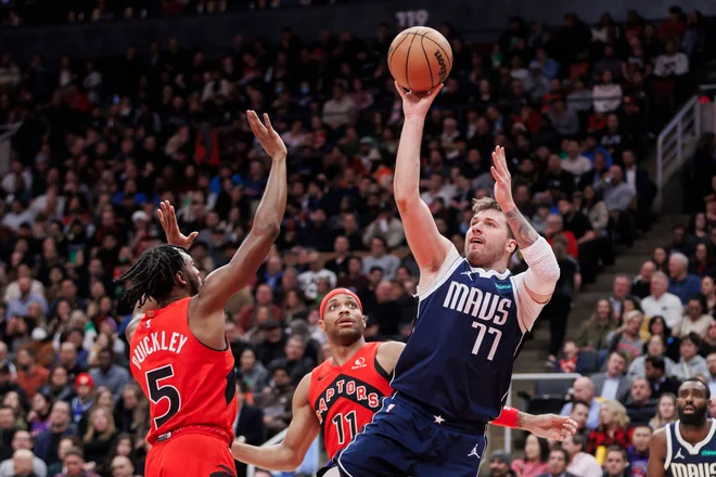 Luka Dončić je dosegel trojni dvojček. FOTO: Cole Burston/AFP