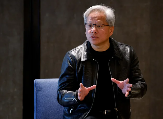 Predsednik uprave Nvidie Jensen Huang verjame, da bo kmalu lahko programiral vsakdo. Foto Edgar Su/Reuters