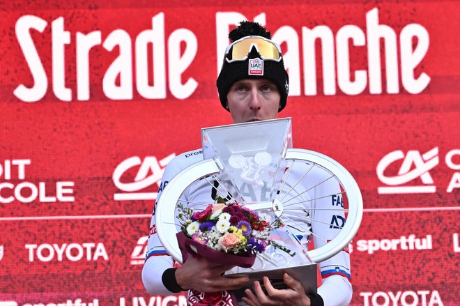 Tadej Pogačar je bil drugič najboljši na toskanskih belih cestah. FOTO: Marco Bertorello/AFP