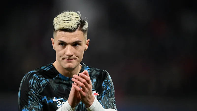 Benjamin Šeško se je utrdil v udarni Leipzigovi enajsterici. FOTO: Annegret Hilse/Reuters