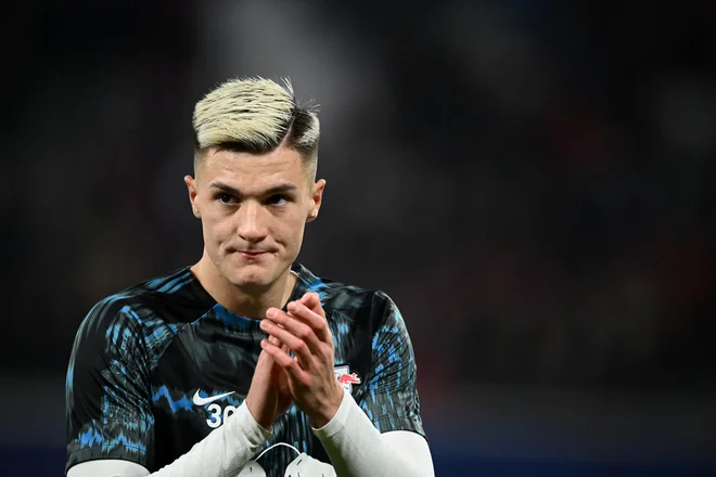 Benjamin Šeško se je utrdil v udarni Leipzigovi enajsterici. FOTO: Annegret Hilse/Reuters