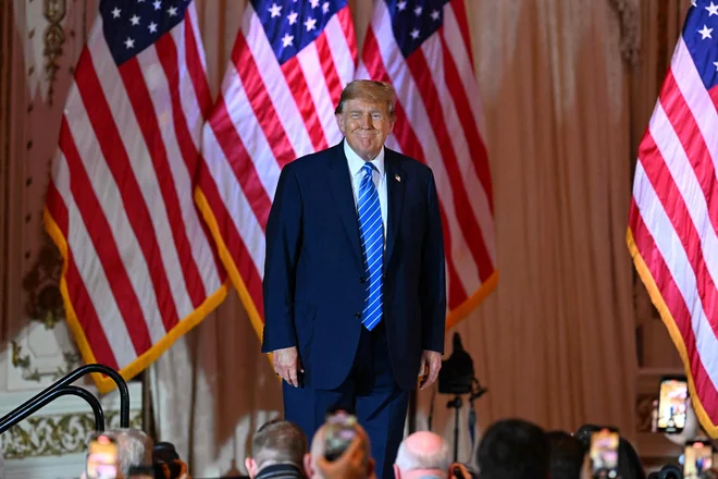 Kot izhaja iz štetja ameriške televizije NBC, ima Trump glede na doslej potrjene zmage 1057 glasov, Haleyjeva pa 92. Za zmago jih je potrebnih 1215. FOTO: Chandan Khanna/AFP