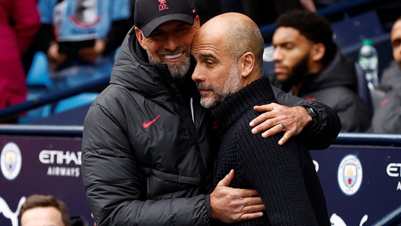 Fotografija: Klopp in Guardiola spoštljivo govorita drug o drugem, a med njima vlada veliko rivalstvo. FOTO: Jason Cairnduff/Reuters