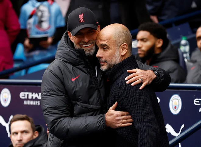 Klopp in Guardiola spoštljivo govorita drug o drugem, a med njima vlada veliko rivalstvo. FOTO: Jason Cairnduff/Reuters