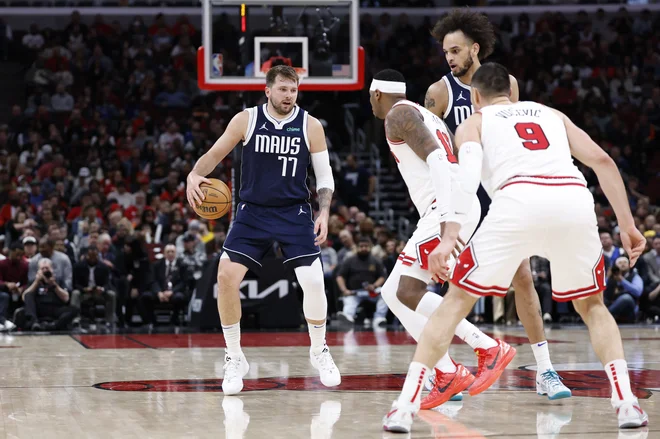 Luka Dončić je v odlični formi. FOTO: Kamil Krzaczynski/Reuters