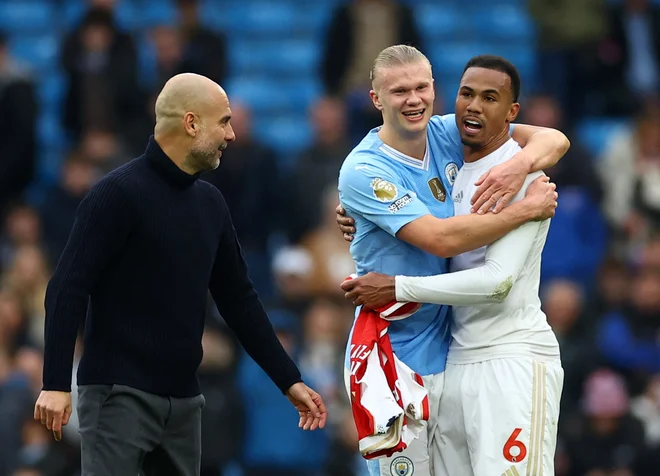 Cityjev trener Pep Guardiola, Erling Braut Haaland in Gabriel Jesus po derbiju. FOTO: Carl Recine/Reuters