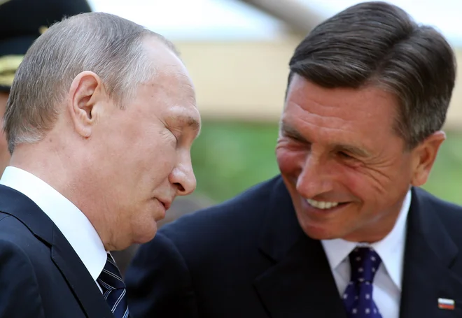 Ruski predsednik Vladimir Putin in takratni slovenski predsednik Borut Pahor na slovesnosti pri Ruski kapelici pod Vršičem leta 2016. FOTO: Tomi Lombar/Delo