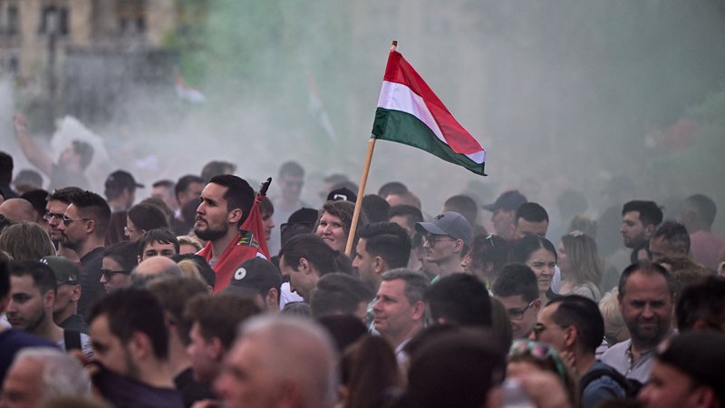 Fotografija: Shod je pod sloganom Nacionalni pohod za novo Madžarsko potekal iz središča mesta do trga pred poslopjem parlamenta. FOTO: Marton Monus/Reuters