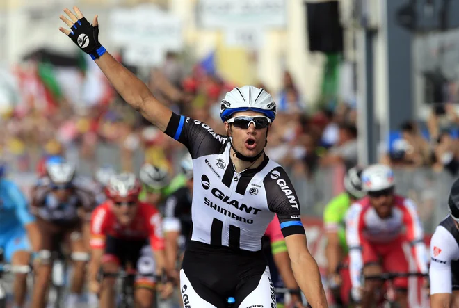 Luka Mezgec je na 97. izvedbi »Giro d'Italia« zmagal v etapi s ciljem v Trstu. FOTO: Luk Benies AFP - International News Agency