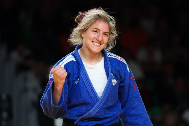 Andreja Leški se je takole veselila osvojitve bronaste kolajne. FOTO: Damir Sencar/AFP