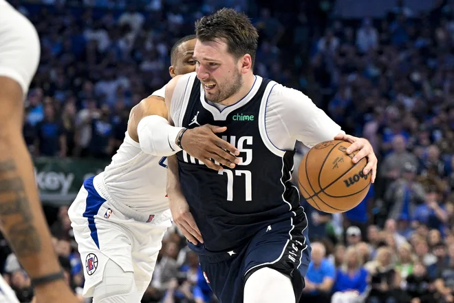 Dončić je prispeval 22 točk in bil najboljši strelec tekme. FOTO: Jerome Miron/Usa Today Sports Via Reuters
