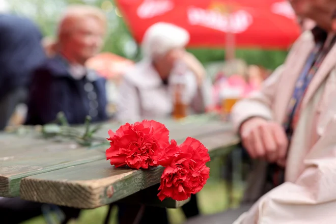 Utrinek s proslave in praznovanja prvega maja na Rožniku. FOTO: Blaž Samec/Delo