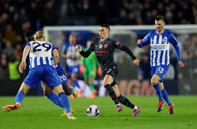 Phil Foden je v letošnji sezoni navdušil v Angliji. FOTO: Toby Melville/Reuters