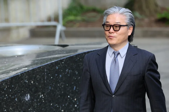 Hwang je iz pripora odšel v zameno za stomilijonsko varščino. FOTO: Brendan Mcdermid/Reuters