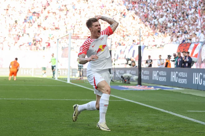 Benjamin Šeško je bil med strelci na zadnjih šestih tekmah Leipziga. FOTO: Ronny Hartmann/AFP