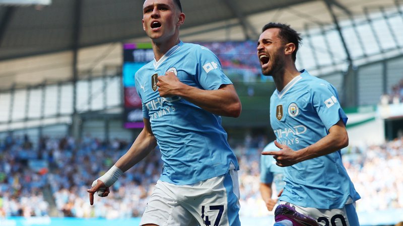Fotografija: Phil Foden je dosegel dva gola za Manchester City. FOTO: Molly Darlington/Reuters
